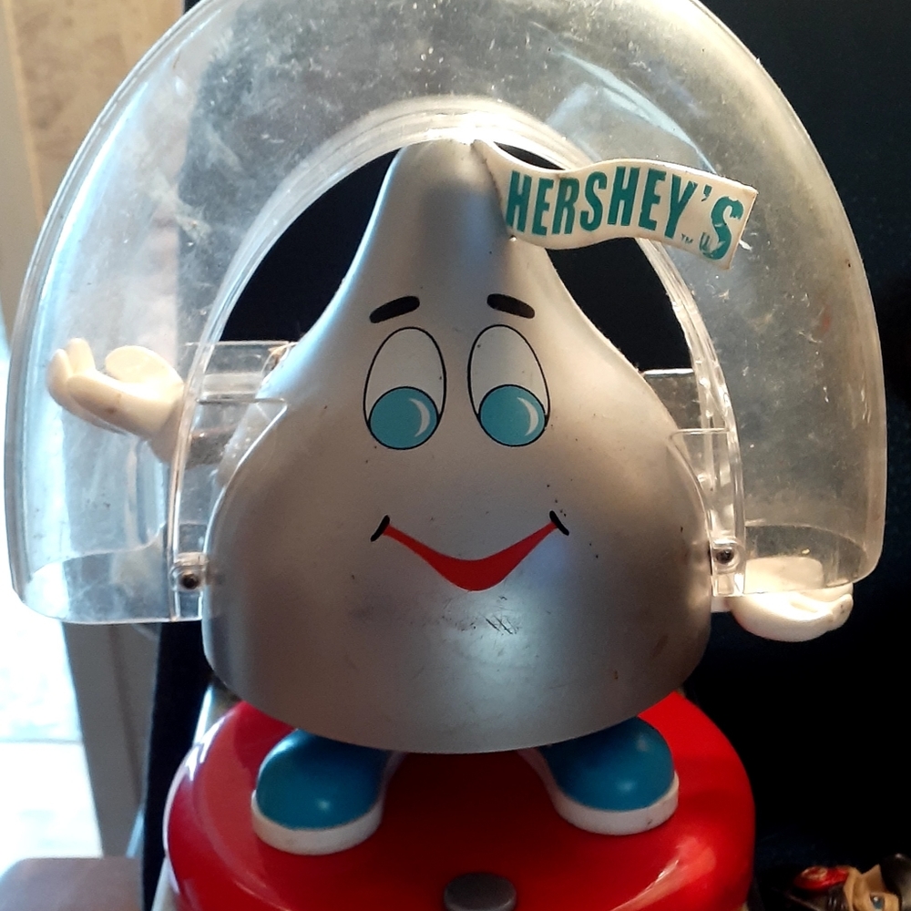 hershey candy machine 2 plastic tonka toys and one happy kids toy